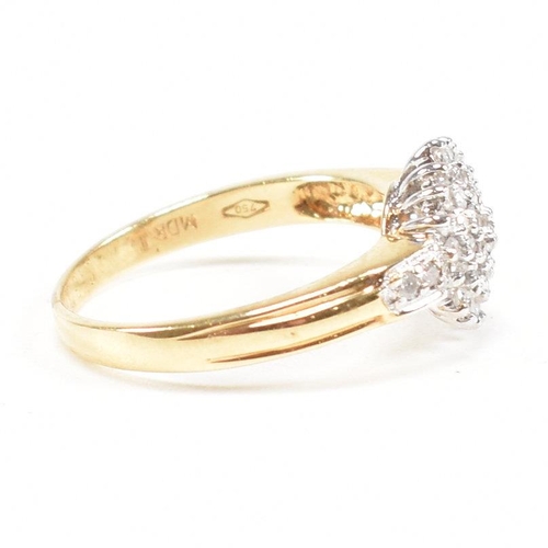 436 - A hallmarked 18ct gold and diamond cluster ring. Estimated diamond weight 0.50ct. Weight 3.4g. Size ... 