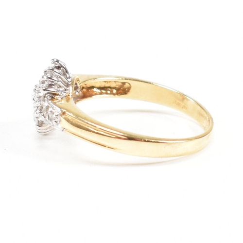 436 - A hallmarked 18ct gold and diamond cluster ring. Estimated diamond weight 0.50ct. Weight 3.4g. Size ... 