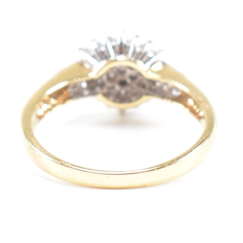 436 - A hallmarked 18ct gold and diamond cluster ring. Estimated diamond weight 0.50ct. Weight 3.4g. Size ... 