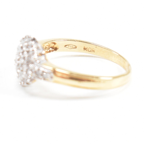 436 - A hallmarked 18ct gold and diamond cluster ring. Estimated diamond weight 0.50ct. Weight 3.4g. Size ... 