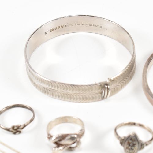 437 - A collection of silver jewellery. The jewellery to include two hallmarked silver bangles, four silve... 