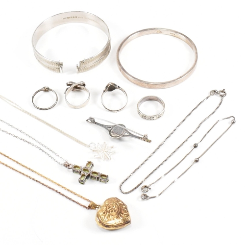 437 - A collection of silver jewellery. The jewellery to include two hallmarked silver bangles, four silve... 