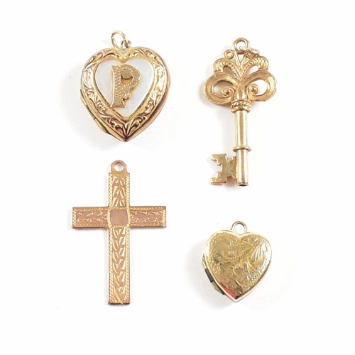 441 - A collection of gold pendants. The pendant to include a 9ct gold back and front heart locket with P ... 