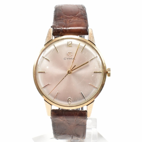 446 - A hallmarked 1960s 9ct gold Cyma gentleman's wrist watch. The watch having champagne dial with baton... 