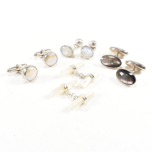 447 - A selection of 925 silver and gem set cufflinks. To include mother of pearl and moonstone. Marked 92... 