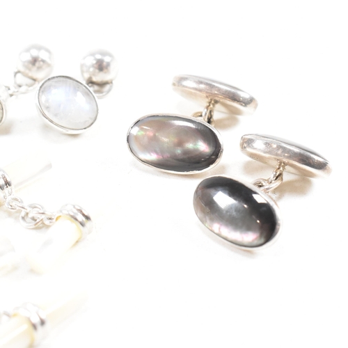 447 - A selection of 925 silver and gem set cufflinks. To include mother of pearl and moonstone. Marked 92... 