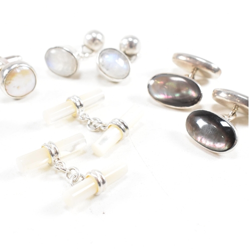 447 - A selection of 925 silver and gem set cufflinks. To include mother of pearl and moonstone. Marked 92... 