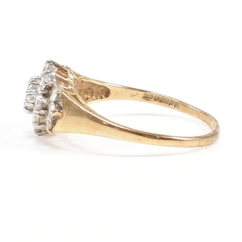 459 - A hallmarked 9ct gold and CZ cluster ring. Weight 2.4g. Size R. All weights, measurements and sizes ... 