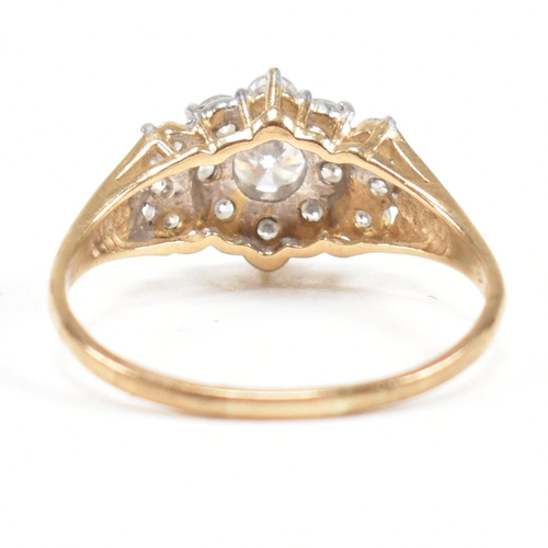 459 - A hallmarked 9ct gold and CZ cluster ring. Weight 2.4g. Size R. All weights, measurements and sizes ... 