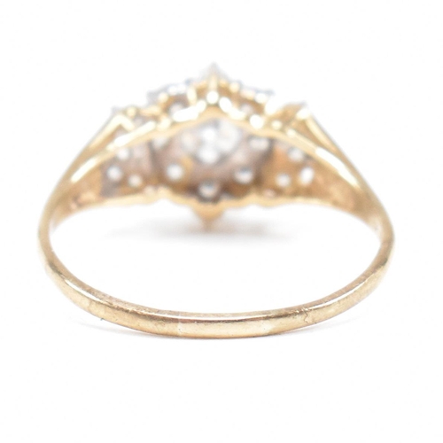 459 - A hallmarked 9ct gold and CZ cluster ring. Weight 2.4g. Size R. All weights, measurements and sizes ... 