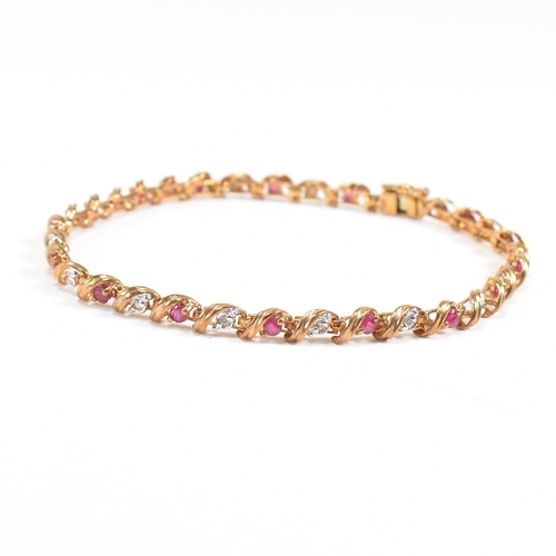 463 - A hallmarked ruby and diamond bracelet. Weight 5.5g. Measures 17.5cm. All weights, measurements and ... 