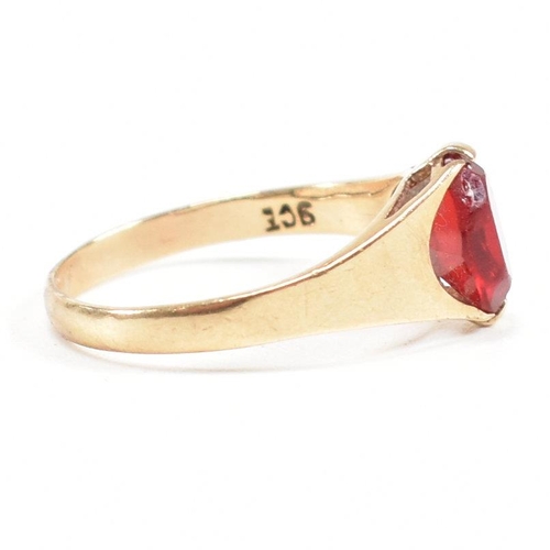 464 - A gold and red paste signet ring. Marked 9ct. Tests indicate gold. Weight 1.6g. Size L.5. All weight... 