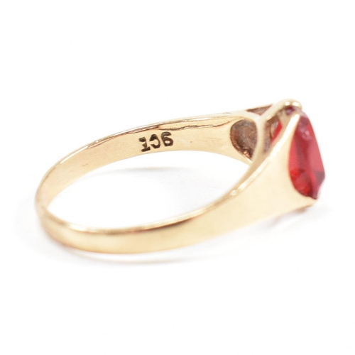 464 - A gold and red paste signet ring. Marked 9ct. Tests indicate gold. Weight 1.6g. Size L.5. All weight... 