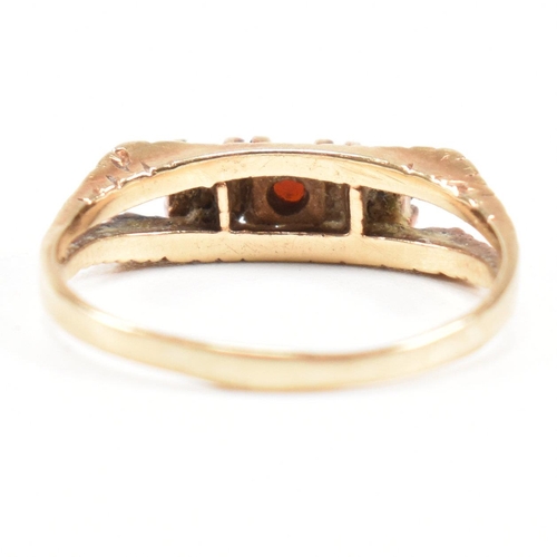 470 - A 1970s gold and garnet three stone ring. Partial marks for 9ct gold. Weight 2.4g. Size P. All weigh... 