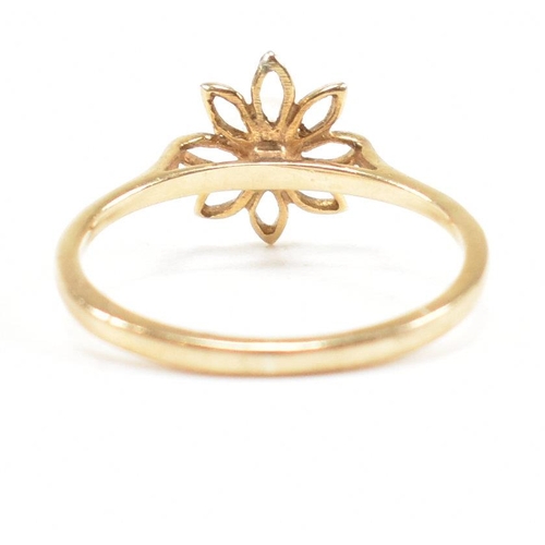 475 - A hallmarked 9ct gold and pearl flower ring. Weight 1g. Size I. All weights, measurements and sizes ... 