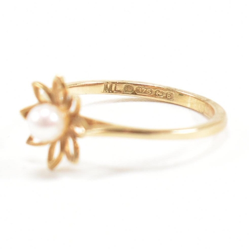 475 - A hallmarked 9ct gold and pearl flower ring. Weight 1g. Size I. All weights, measurements and sizes ... 