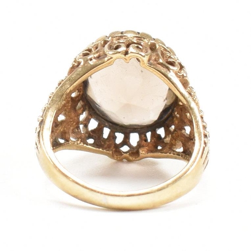 478 - A hallmarked 9ct gold and smoky quartz ring. Weight 5.4g. Size H. All weights, measurements and size... 