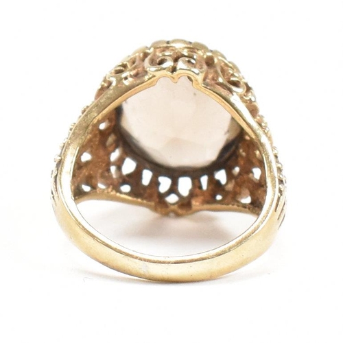 478 - A hallmarked 9ct gold and smoky quartz ring. Weight 5.4g. Size H. All weights, measurements and size... 