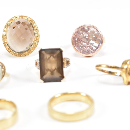 48 - A collection of 925 silver gilt vermeil and gem set rings. The rings to include CZ, rose and smoky q... 