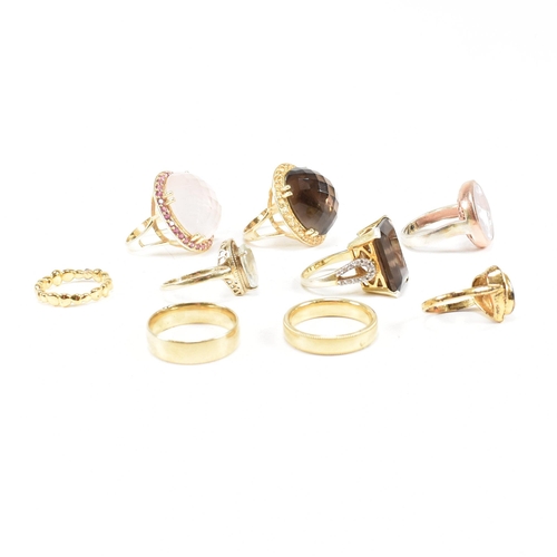 48 - A collection of 925 silver gilt vermeil and gem set rings. The rings to include CZ, rose and smoky q... 