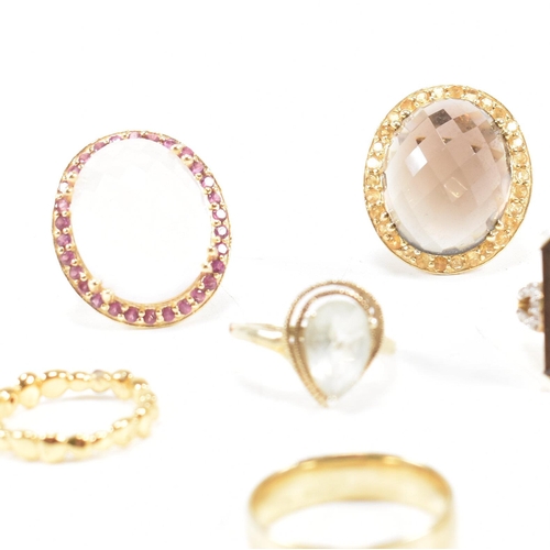 48 - A collection of 925 silver gilt vermeil and gem set rings. The rings to include CZ, rose and smoky q... 