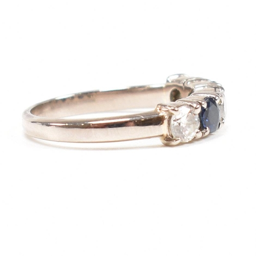 489 - An 18ct white gold sapphire and diamond five stone ring. Estimated total diamond weight 0.60ct. Esti... 