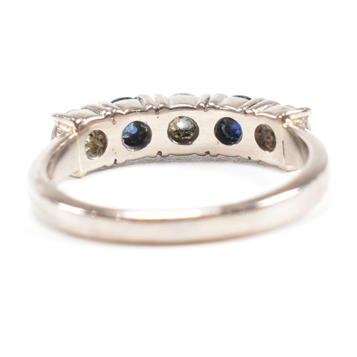 489 - An 18ct white gold sapphire and diamond five stone ring. Estimated total diamond weight 0.60ct. Esti... 