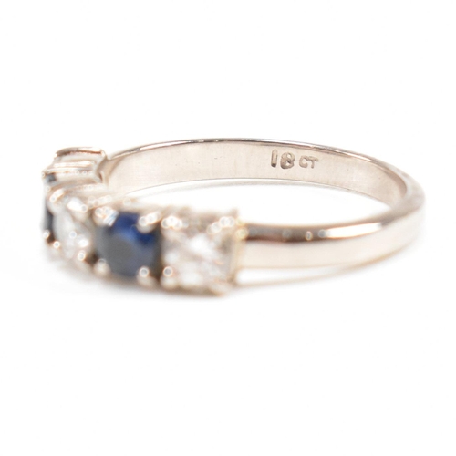 489 - An 18ct white gold sapphire and diamond five stone ring. Estimated total diamond weight 0.60ct. Esti... 