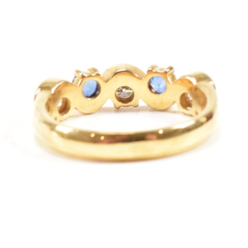 52 - A hallmarked 18ct gold sapphire and diamond five stone ring. The ring set with three round brilliant... 