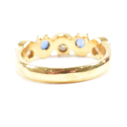 52 - A hallmarked 18ct gold sapphire and diamond five stone ring. The ring set with three round brilliant... 