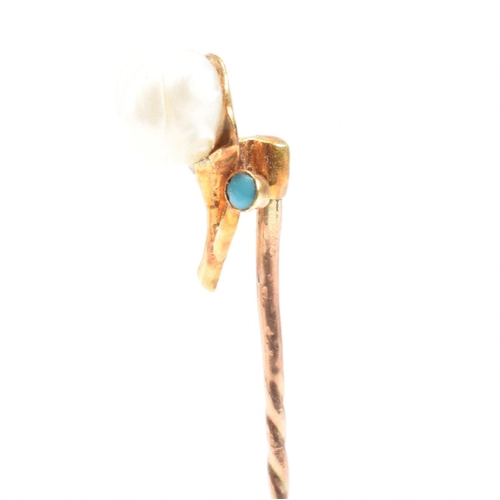 54 - A cased 19th century gold, pearl and turquoise stick pin in the form of a flower. Stamped 9ct to pin... 