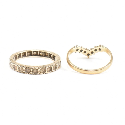 56 - Two hallmarked 9ct gold gem set rings. A hallmarked 9ct gold eternity ring set with white stones tog... 