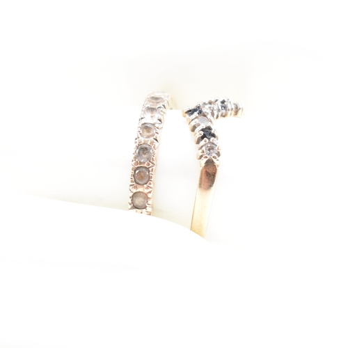 56 - Two hallmarked 9ct gold gem set rings. A hallmarked 9ct gold eternity ring set with white stones tog... 