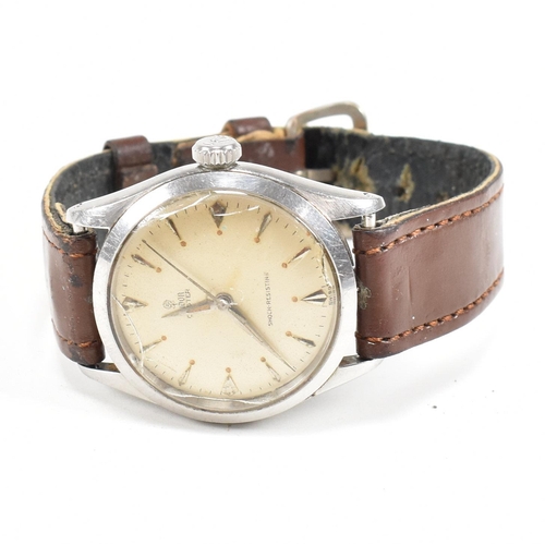 58 - A Mid century Tudor Oyster wristwatch. Stainless steel case with champagne dial, baton and diamond s... 