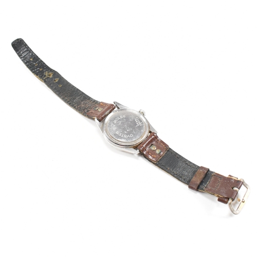 58 - A Mid century Tudor Oyster wristwatch. Stainless steel case with champagne dial, baton and diamond s... 