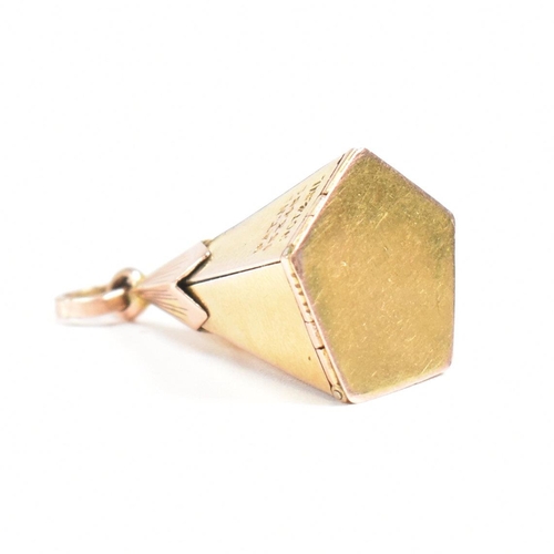 61 - A 1920s 9ct gold and silver Masonic pyramid star pendant. The pyramid opening to reveal a five point... 