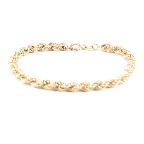 64 - A hallmarked 9ct gold rope twist chain linked bracelet. Weight 3.6g. Measures 17.5cm.
 All weights, ... 