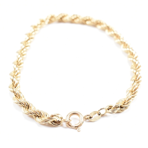 64 - A hallmarked 9ct gold rope twist chain linked bracelet. Weight 3.6g. Measures 17.5cm.
 All weights, ... 