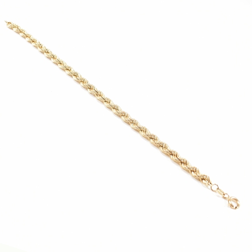 64 - A hallmarked 9ct gold rope twist chain linked bracelet. Weight 3.6g. Measures 17.5cm.
 All weights, ... 