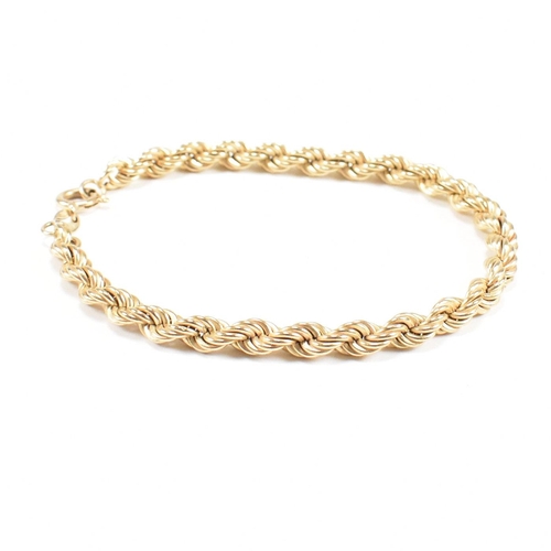 64 - A hallmarked 9ct gold rope twist chain linked bracelet. Weight 3.6g. Measures 17.5cm.
 All weights, ... 