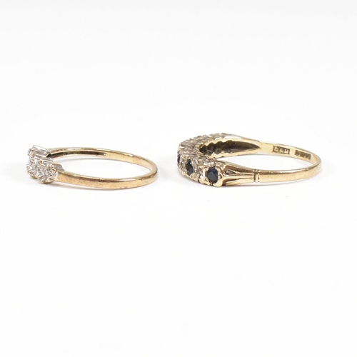 75 - Two hallmarked 9ct gold half hoop rings. A diamond set half hoop ring with star decoration and a sap... 