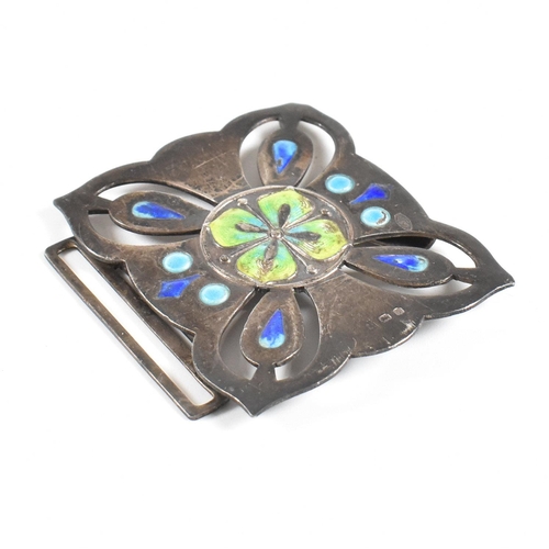 80 - An Art Nouveau hallmarked silver and enamel belt buckle. The buckle decorated with blue green and ye... 