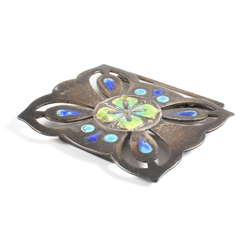 80 - An Art Nouveau hallmarked silver and enamel belt buckle. The buckle decorated with blue green and ye... 