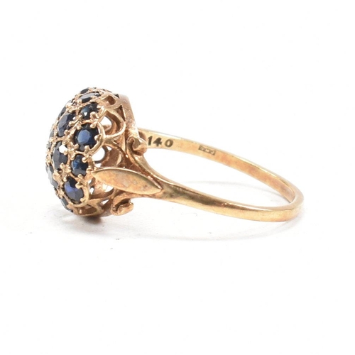 83 - A hallmarked 9ct gold and sapphire bombe ring. Weight 3.3g. Size R. All weights, measurements and si... 