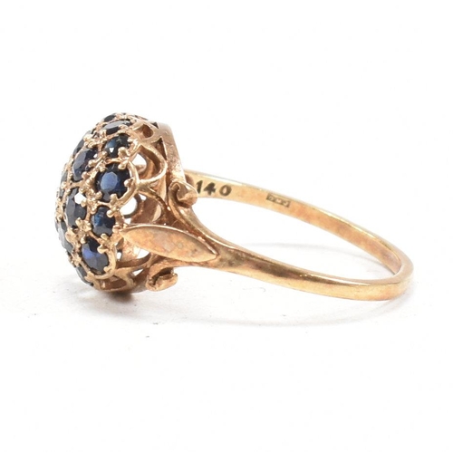 83 - A hallmarked 9ct gold and sapphire bombe ring. Weight 3.3g. Size R. All weights, measurements and si... 