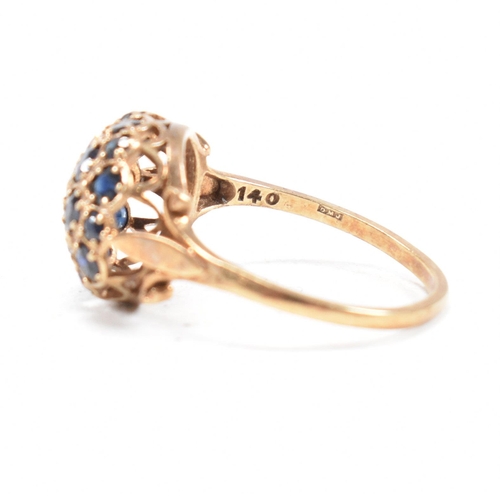 83 - A hallmarked 9ct gold and sapphire bombe ring. Weight 3.3g. Size R. All weights, measurements and si... 