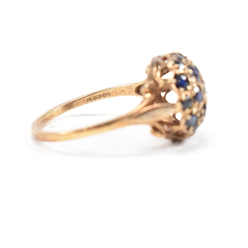 83 - A hallmarked 9ct gold and sapphire bombe ring. Weight 3.3g. Size R. All weights, measurements and si... 