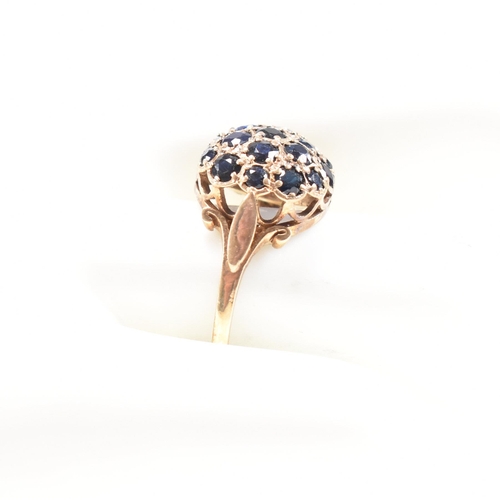 83 - A hallmarked 9ct gold and sapphire bombe ring. Weight 3.3g. Size R. All weights, measurements and si... 