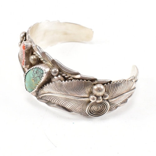 89 - A signed Lester Craig Navajo Diné Sterling Silver turquoise and coral cuff bangle. Stamped Les Craig... 