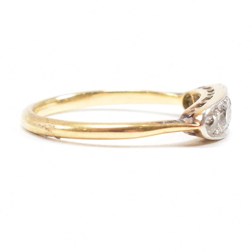 9 - A  gold and diamond five stone ring. The ring set with five graduating old cut diamonds to lozenge s... 